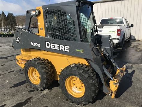 320e skid steer loader|john deere 320e bucket hinge.